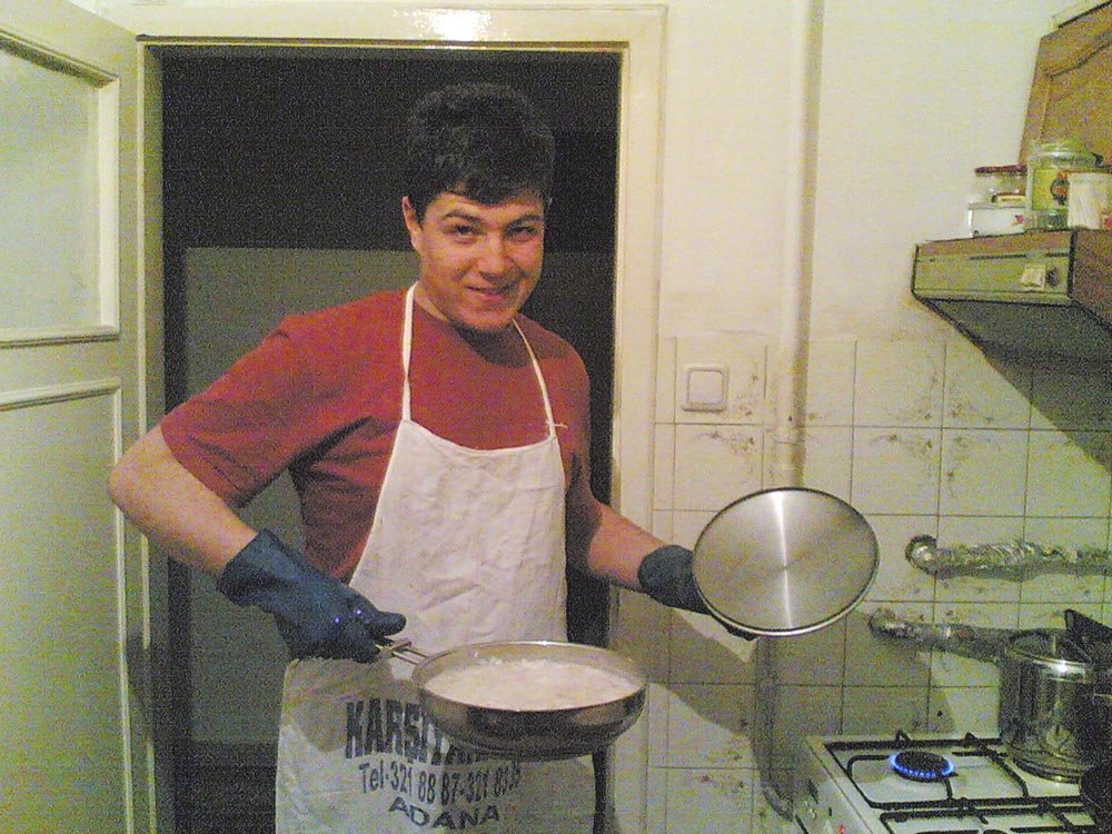 COOKING ROOTS: In 2008, while attending college in Ankara, Turkey, Omer Onder cooks a meal for around 20 friends at a party.